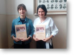 Ocenen dievat: E. Lacov a K. Komrov s diplomami